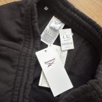 REEBOK, čierne UNISEX tepláky